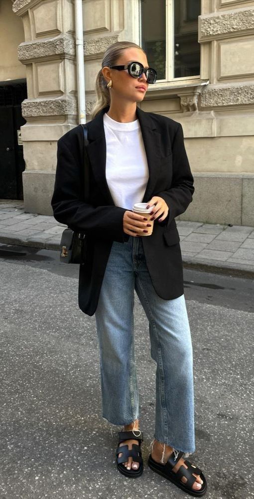 blazer over a white tee, paired with light blue jeans